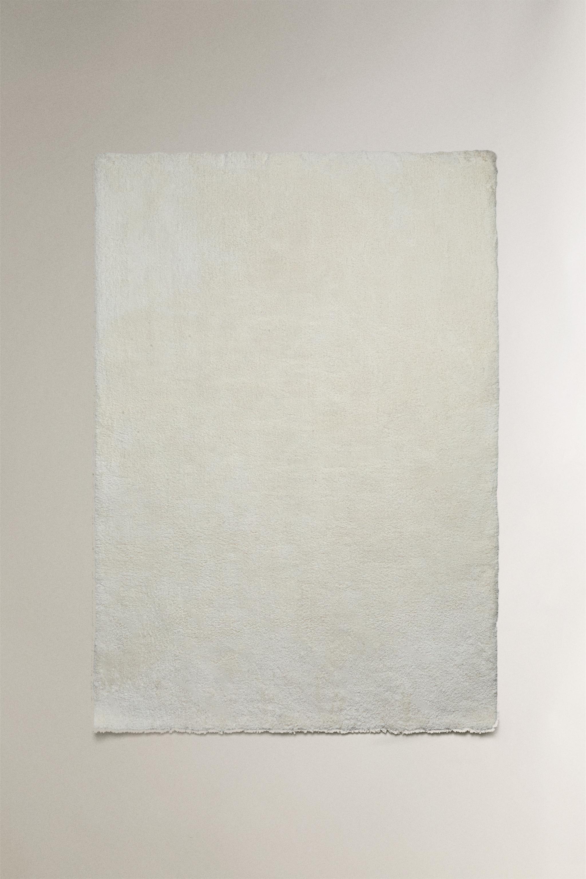 SOFT TEXTURED AREA RUG